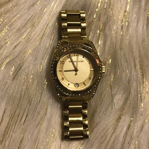 Women’s micheal kors gold watch